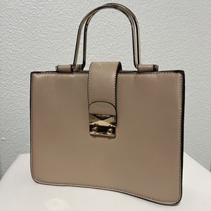 Tan hand bag with gold details ( not real gold )